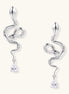Coiled gold-plated snake earrings with zirconia stones and teardrop crystal dangles against white background.