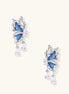 Gold-plated brass earrings featuring blue denim fabric insets and sparkling zirconia crystals with teardrop dangles