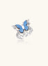 Gold-plated brass ring featuring blue butterfly design with central zirconia stone on neutral background.