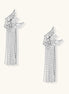 Gold-plated wing earrings with delicate chain fringe tassels creating movement and celestial appeal