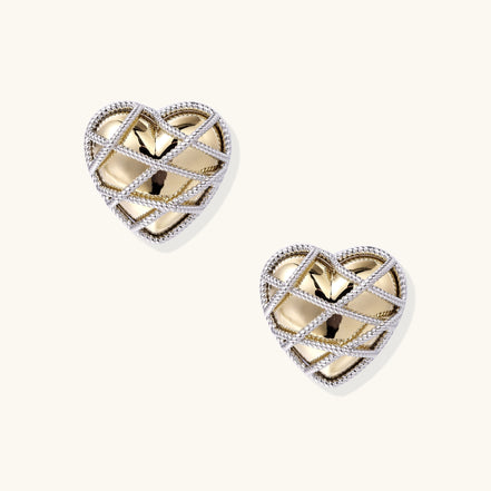 Heart-shaped gold plated earrings with silver rope lattice design and intricate open knotwork pattern