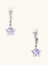 Drop earrings with purple star-shaped zirconia stones and clear teardrop accents in gold-plated brass setting