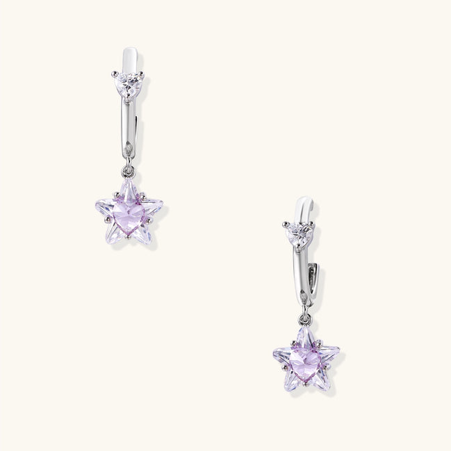 Drop earrings with purple star-shaped zirconia stones and clear teardrop accents in gold-plated brass setting