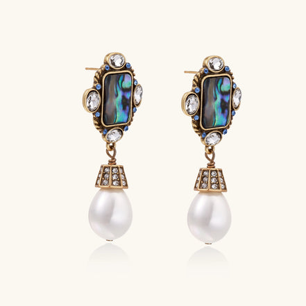 Gold-plated brass drop earrings featuring iridescent abalone shell centers, crystal accents, and white pearl drops.