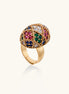 Domed gold-plated ring with geometric mosaic pattern featuring blue, green, red and clear zirconia stones in diamond settings