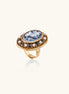 Oval cameo ring with blue-grey floral design surrounded by white shell pearls in gold-plated brass setting