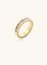 14K gold plated ring with channel-set zirconia stones and Greek key pattern engraved on sides on white background