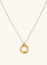 Close-up of a gold-plated stainless steel necklace with interlocking twisted ring pendant on white background