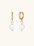 18K gold plated hoop earrings with freshwater pearl drops on neutral background, showing elegant minimalist design.