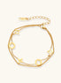 Dainty gold-plated bracelet with star and clover charms on double chain with adjustable extender