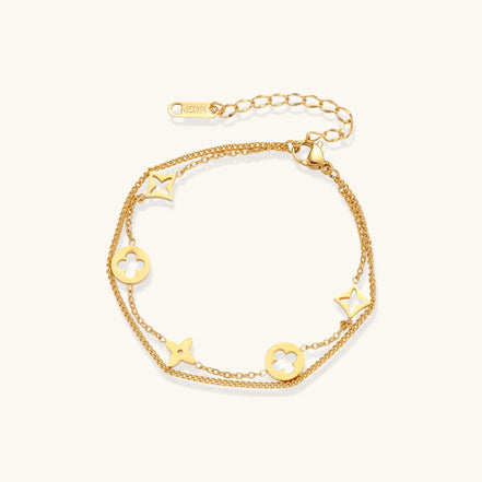 Dainty gold-plated bracelet with star and clover charms on double chain with adjustable extender