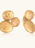 Sculptural gold-plated stainless steel earrings with three hammered oval shapes arranged in artistic cluster formation