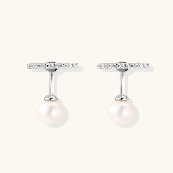 Rhodium-plated sterling silver ear jacket earrings with diamond-set horizontal bar and freshwater pearl drop