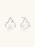 Silver mountain outline studs with baroque pearl and diamond accent on white background